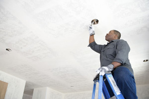 An electrician fixing wires