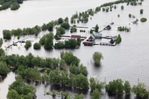 Flooded village in lowland of Great river